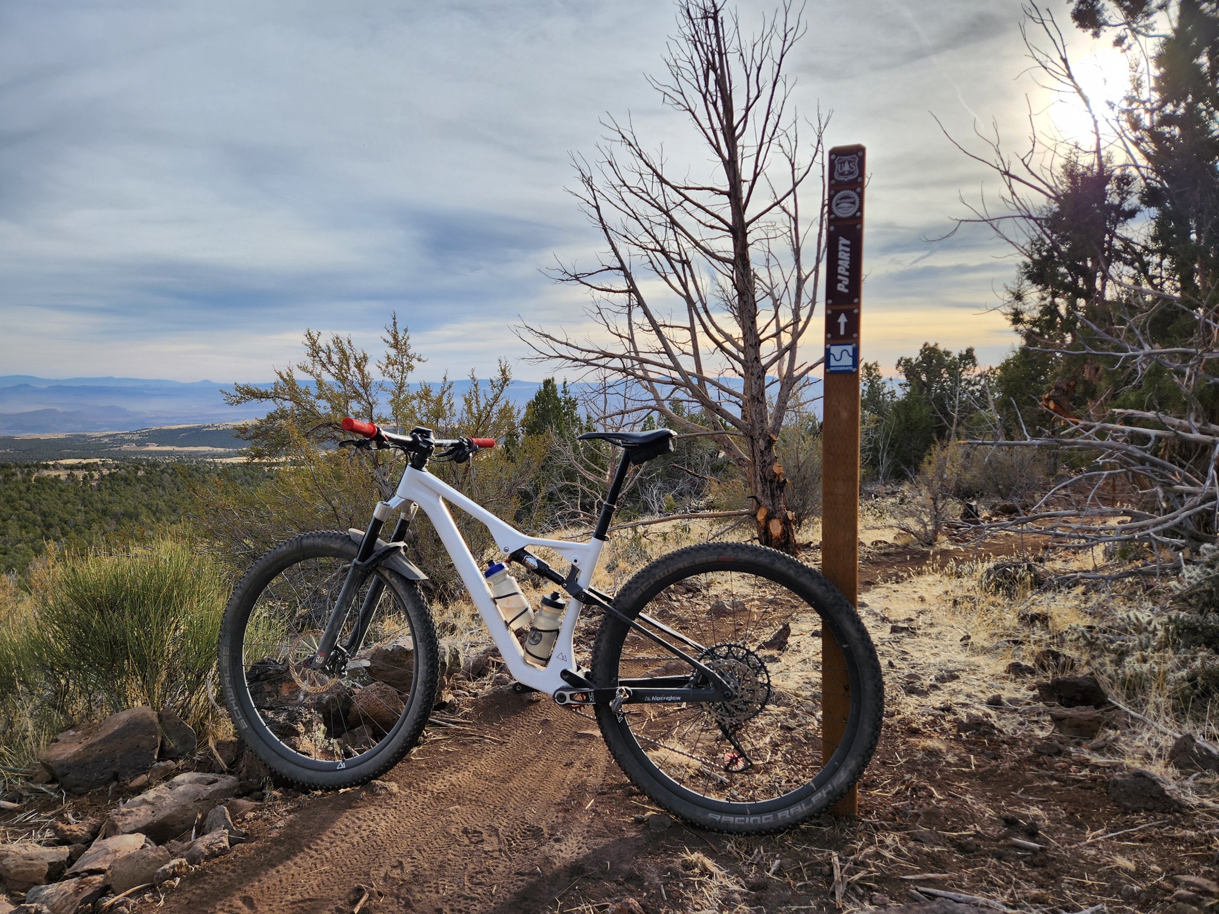 White and black Ridge full-suspension bike on Utah singletrack